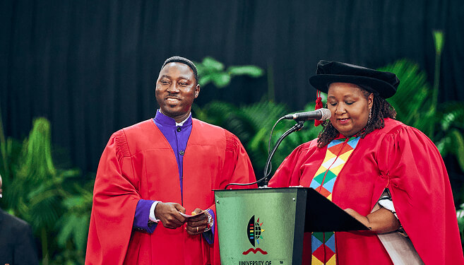 PhD graduate, Dr Isaac Nketsia (left), with College Dean of Research, Professor Phocenah Nyatanga.
